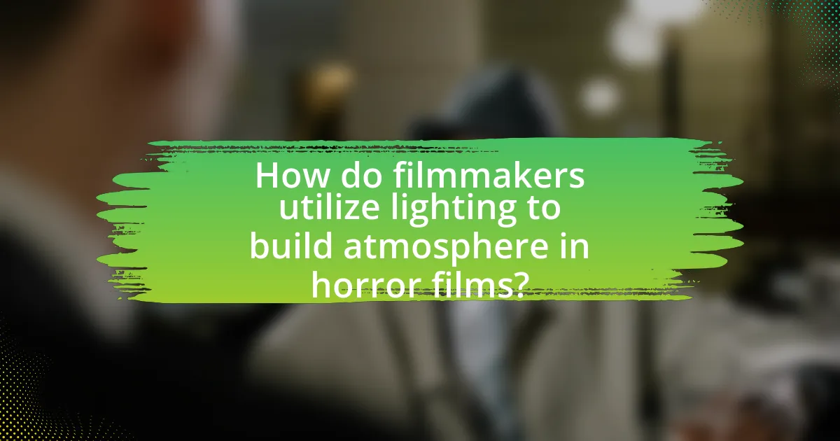 How do filmmakers utilize lighting to build atmosphere in horror films?